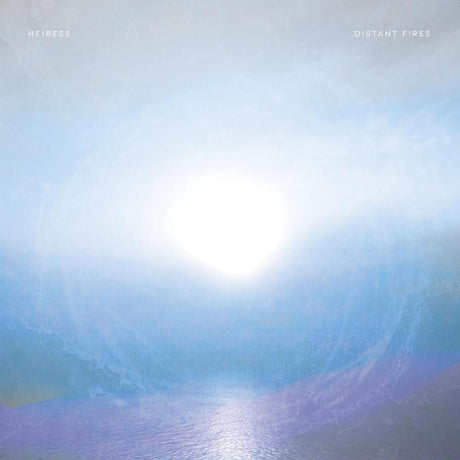 Vinyl record cover for Heiress - Distant Fires featuring a stylized image of a sun or another celestial body with a blue and purple hue.