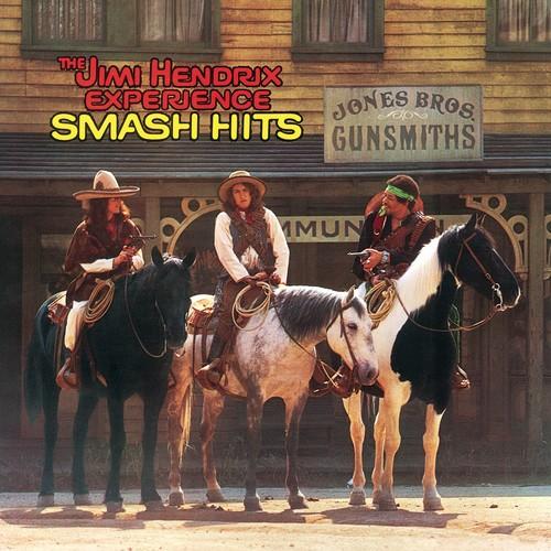 The cover of the 'Smash Hits' vinyl record by Jimi Hendrix Experience featuring three individuals on horses in front of a store front.