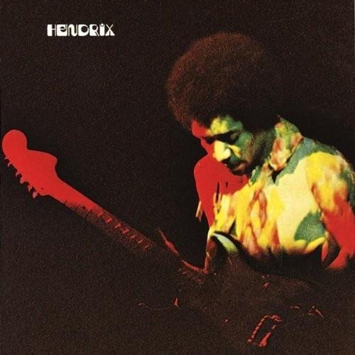 Jimi Hendrix album cover for 'Band Of Gypsys' showing him playing a red guitar.