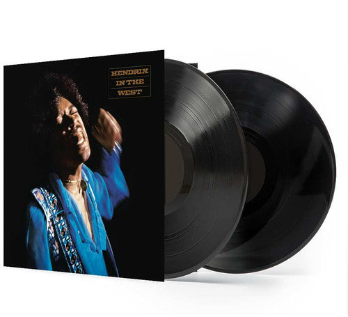 Vinyl records with a cover featuring a person in a blue outfit on a white background