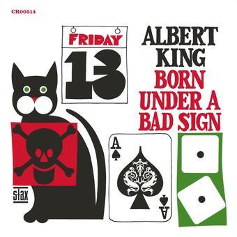 Album cover for Albert King's 'Born Under A Bad Sign' featuring a black cat, playing cards, and a skull symbol, with the text 'Friday 13' and the Stax Records logo.