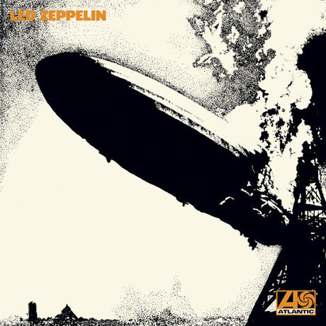 Album cover of 'Led Zeppelin - Led Zeppelin I' featuring a black and white image of a blimp with trees in the background.