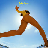 A vinyl record cover featuring the artist Lorde with the title 'Solar Power' prominently displayed, against a blue sky and ocean background.