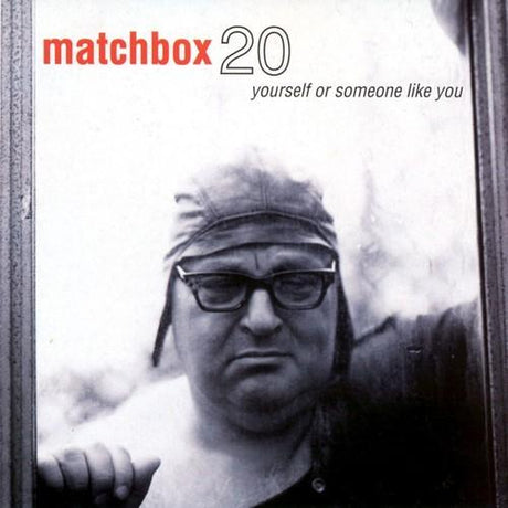 Album cover for 'yourself or someone like you' by Matchbox 20 featuring a person with glasses and a cap.