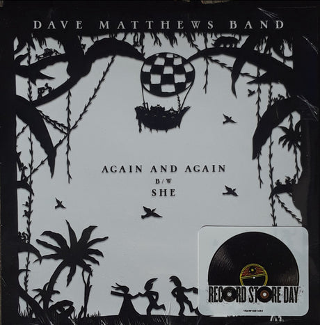 black and white cover with a boat floating hot air balloon and trees