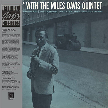 Album cover with a man holding a saxophone and text about the Miles Davis Quintet.