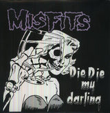 The image displays the cover art for the Misfits album 'Die Die My Darling', featuring a black and white comic-style illustration.