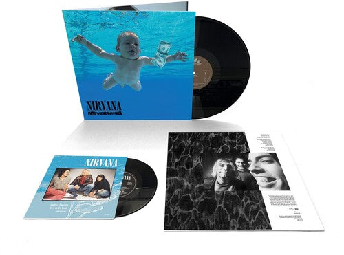 Nirvana vinyl album with cover and additional materials on a white background