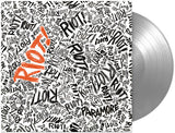 Silver colored vinyl LP record of Paramore's album 'Riot!' with a text-based cover design.