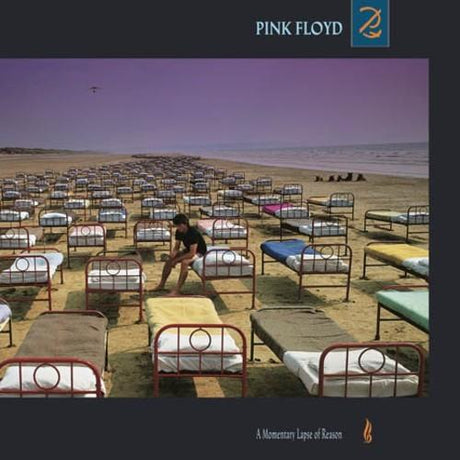 Cover art for Pink Floyd album 'Momentary Lapse Of Reason' depicting a dark, eerie landscape at night with a figure standing in the foreground.