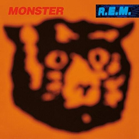 This image features the album cover for "Monster" by R.E.