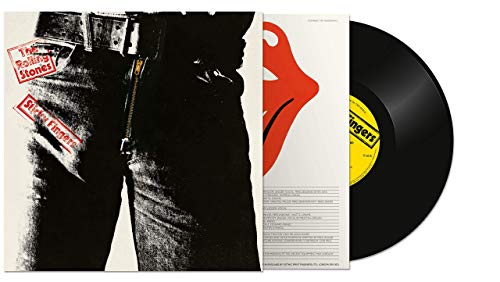 'Sticky Fingers' by the Rolling Stones showing the vinyl record and front cover with the Andy Warhol design of a man's waist and upper legs in black jeans and belt.