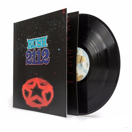 A vinyl record of the album 'Rush - 2112' by the band Rush, featuring the album cover with a black background and the band's logo design in red.