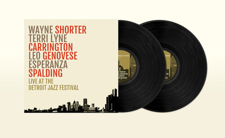 Cover art for 'Wayne Shorter - Live At The Detroit Jazz Festival' featuring a stylized cityscape with buildings and the Detroit Jazz Festival logo.
