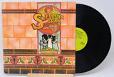 Steeleye Span - Parcel Of Rogues vinyl record album cover featuring a cartoon illustration of a character and a rook (bird).