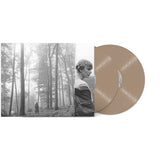 A beige vinyl record labeled 'Folklore' by Taylor Swift, with an image of a person in a woodsy setting on the cover.