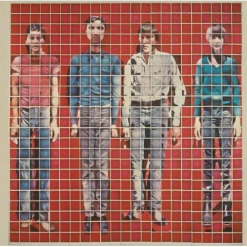Album cover featuring a grid of four images of people in various poses against a red background, with a Talking Heads song title in the upper right corner.