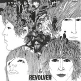 The album cover of 'Revolver' by The Beatles featuring a black and white illustration with multiple exposures of the band members' faces.