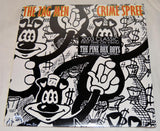 Front cover of 'Crime Spree' by The Zag Men showing black and white drawings of a cartoon character with 3 eyes and bags of money.