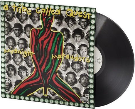 Vinyl record with 'A Tribe Called Quest' album cover featuring a colorful abstract design and faces.