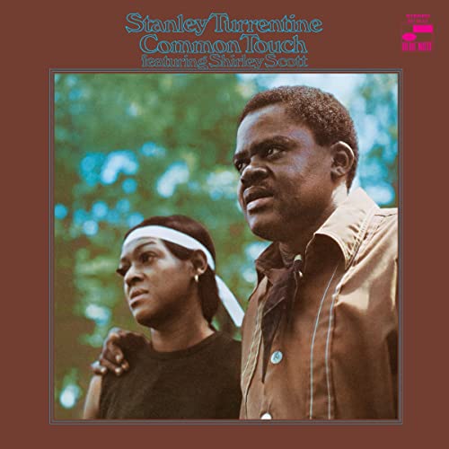 Vinyl record cover for 'Stanley Turrentine - Common Touch' featuring images of the artist and another person looking off to the distance.