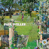 Album cover with a garden scene and 'Paul Weller 22 Dreams' text