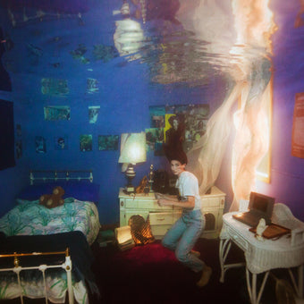 Cover art featuring a bedroom underwater with a person floating