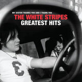 Album cover of 'The White Stripes Greatest Hits' featuring a black and white photograph of Jack and Meg White in a car, with the title text overlaid.