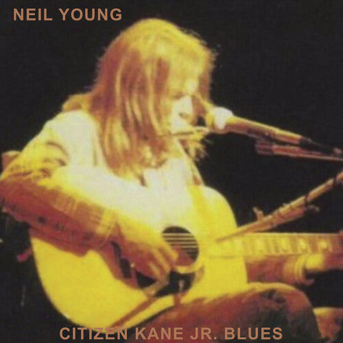 A vinyl record album cover featuring Neil Young playing an acoustic guitar on stage with the title 'Citizen Kane Jr. Blues' displayed.