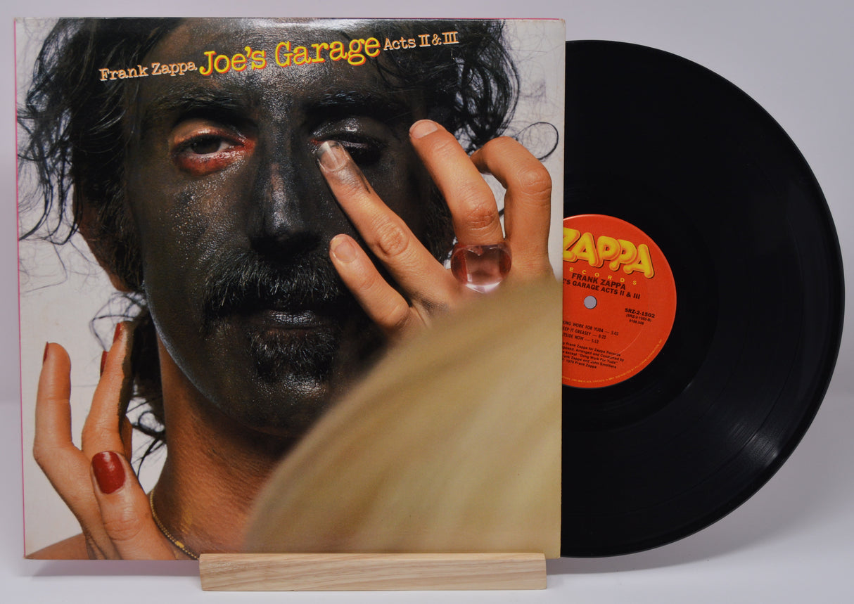 Vinyl record and front cover of 'Frank Zappa - Joe's Garage Acts II III'