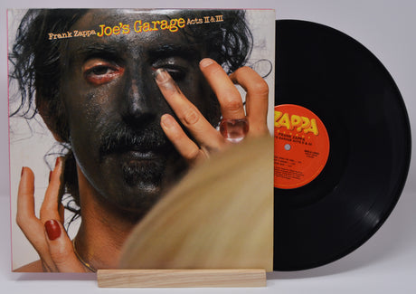 Vinyl record and front cover of 'Frank Zappa - Joe's Garage Acts II III'