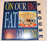A House - Big Fat Merry-Go-Round