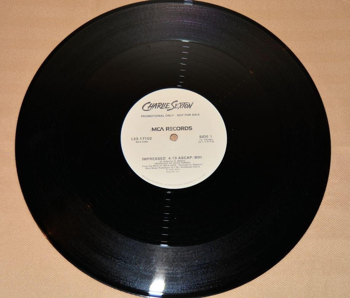 Sexton, Charlie - Impressed