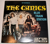 Cynics, The - Blue Train Station