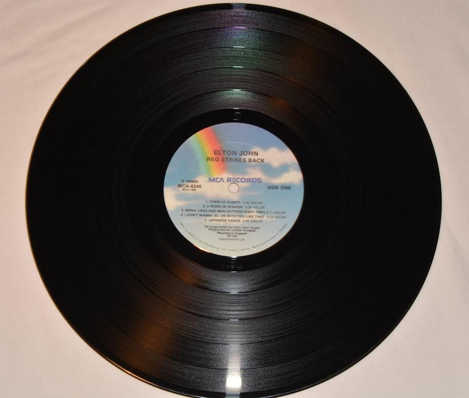 John, Elton - Reg Strikes Back