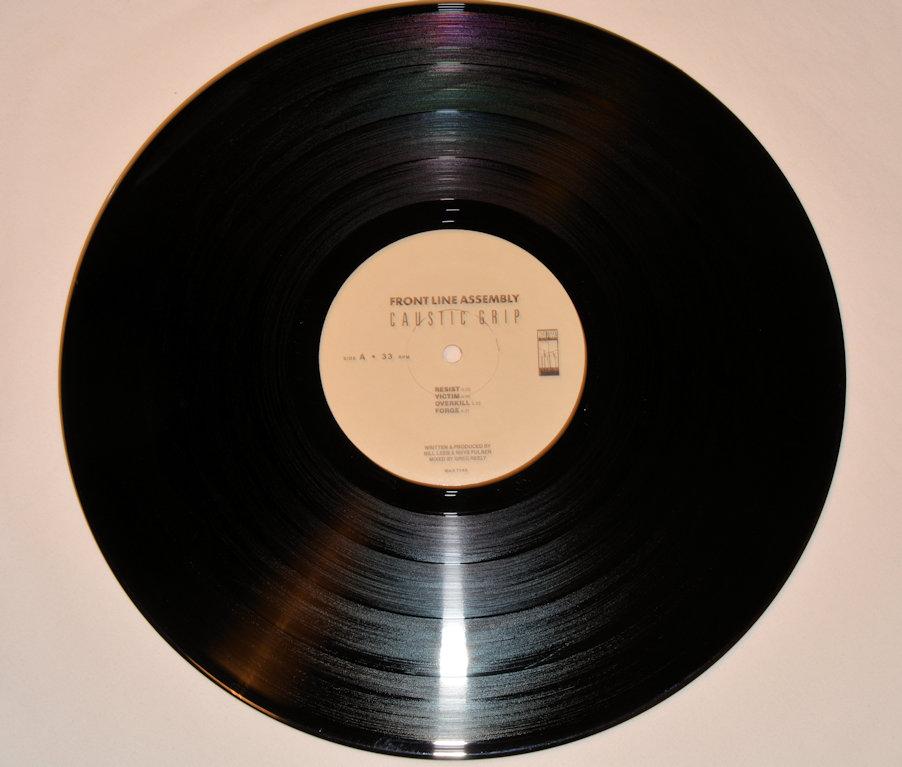 Front Line Assembly - Caustic Grip