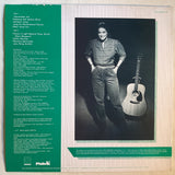 Griffith, Nanci - There's A Light Beyond These Woods