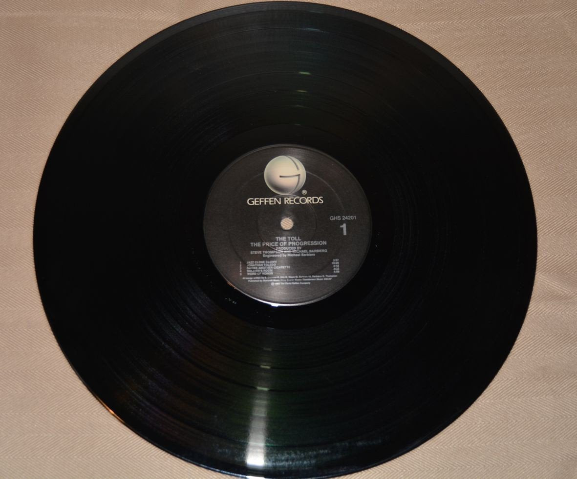 Toll, The - The Price of Progression